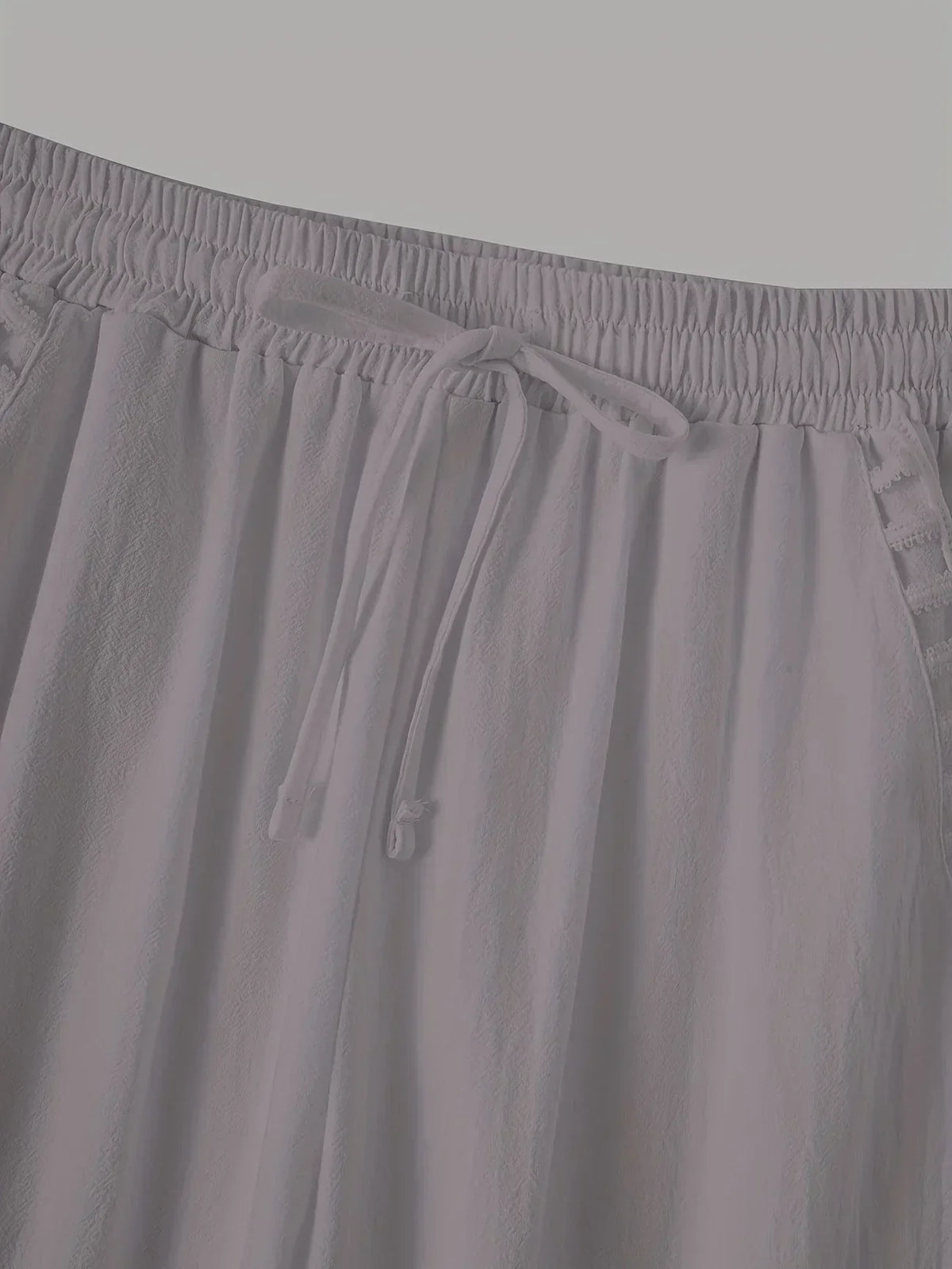 Pantaloni cropped Tracey con finiture a contrasto